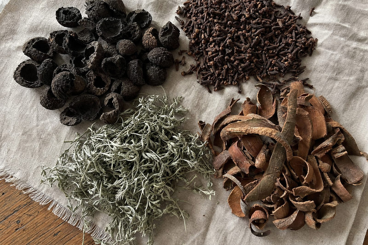 Black walnut hulls, wormwood, cloves and pau d'arco bark on linen